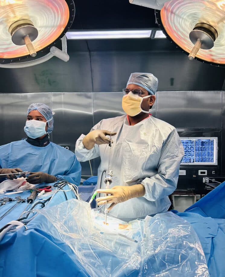 Dr. M.D.S. Sasidharan performing minimally invasive spine surgery, Chennai